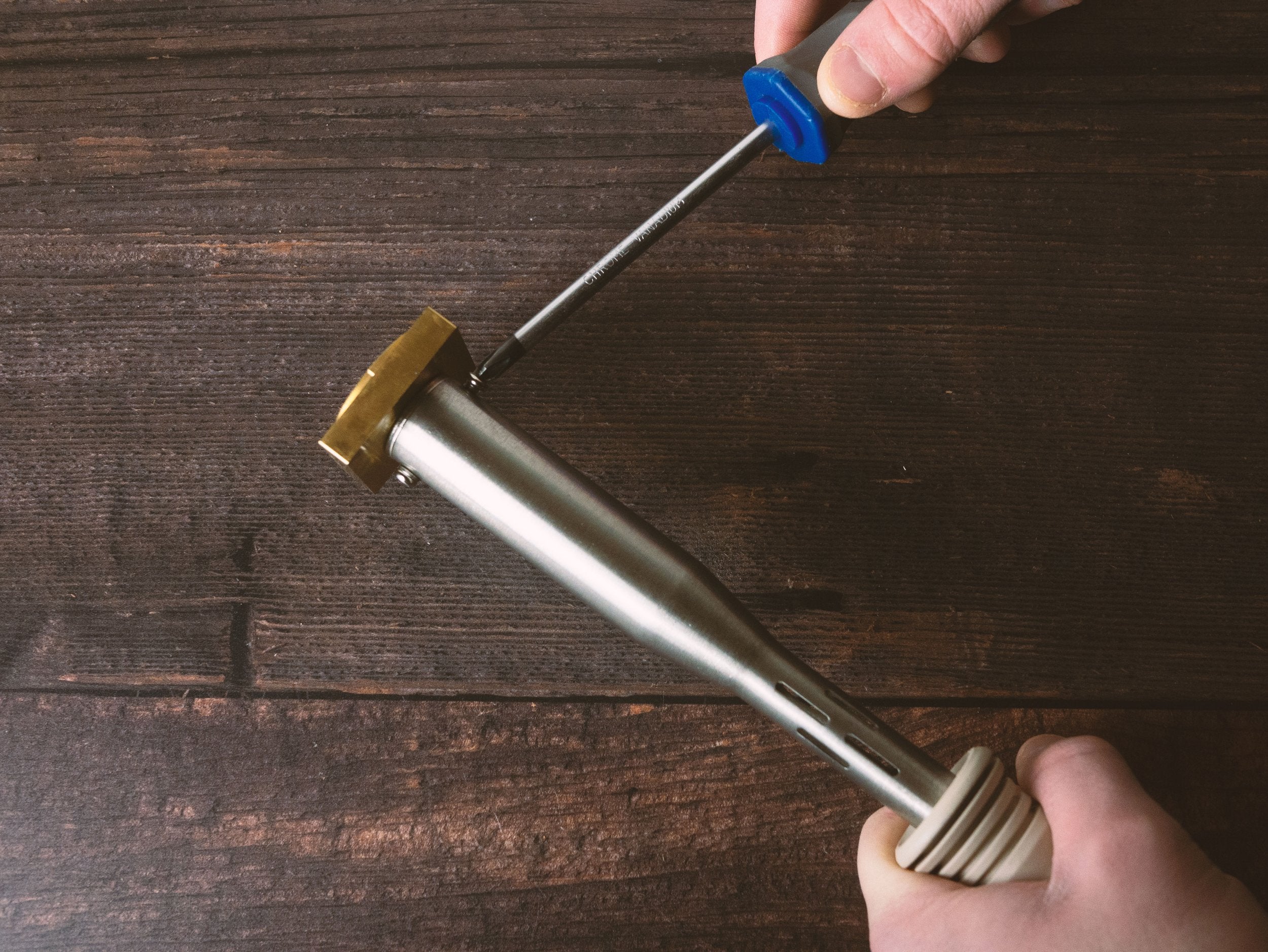 Screwing Iron Head into Electric Branding Iron Heater - Outpost Workshop