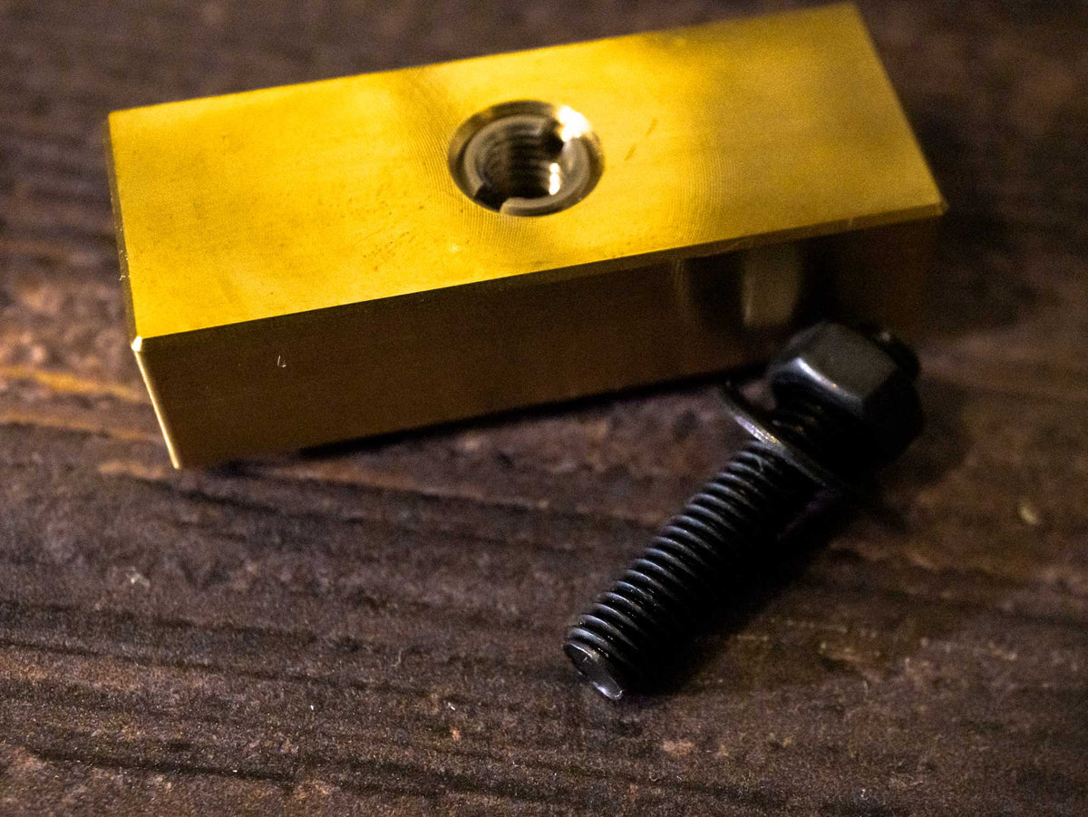 A brass leather stamp with M8-M5 adaptor for hot stamping machines