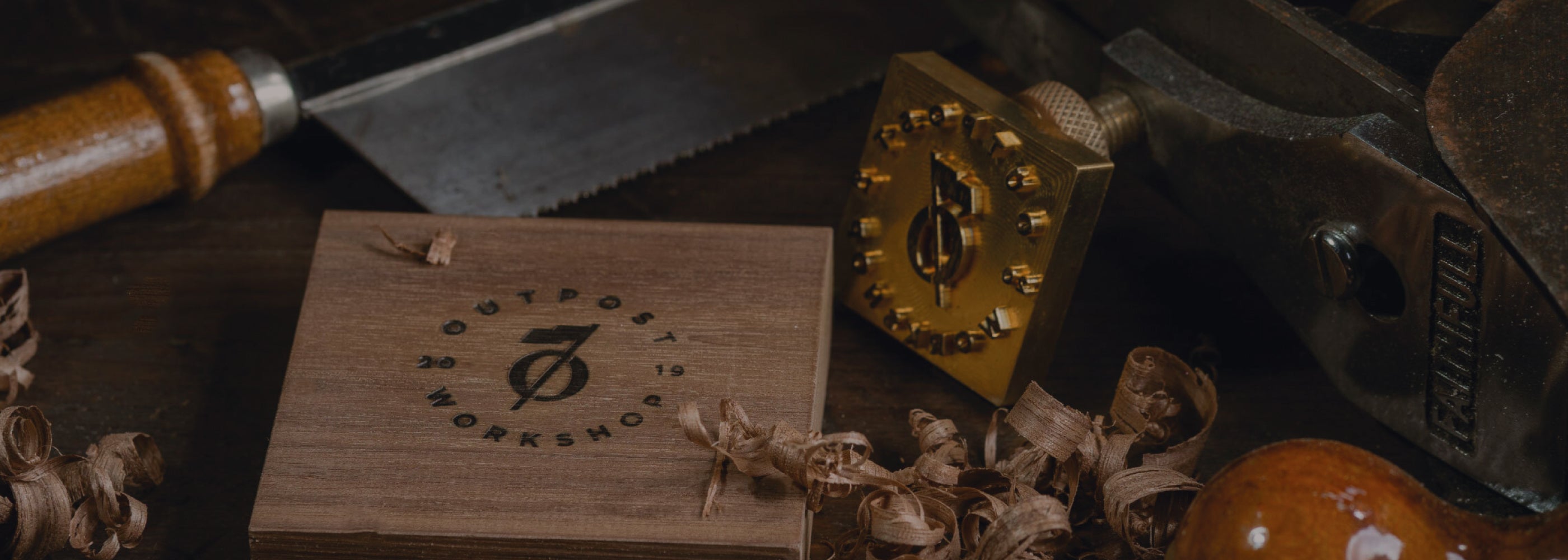 Outpost Workshop Logo Branded In Wood