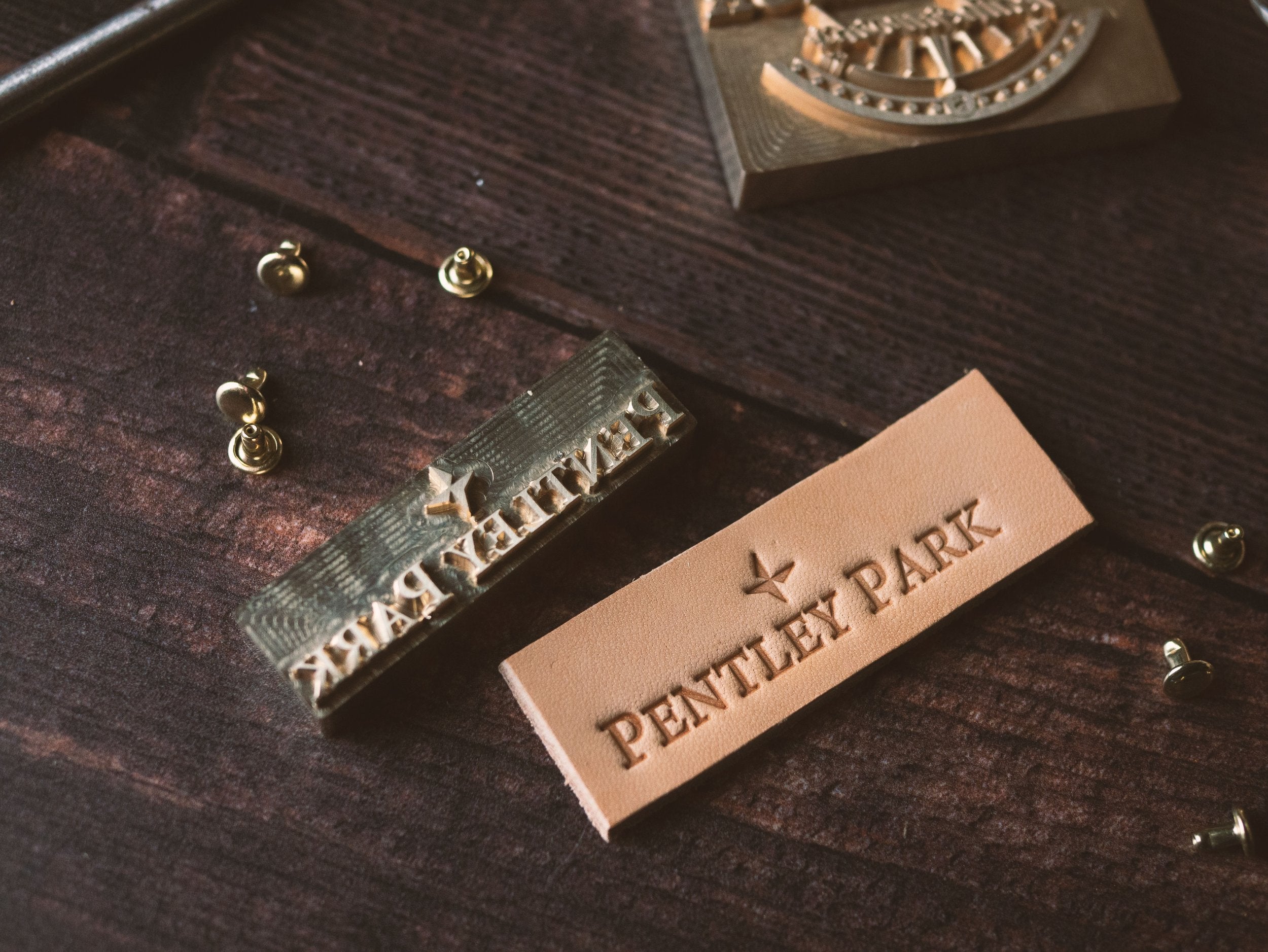 Logo Embossed into Leather using Arbor Press - Outpost Workshop