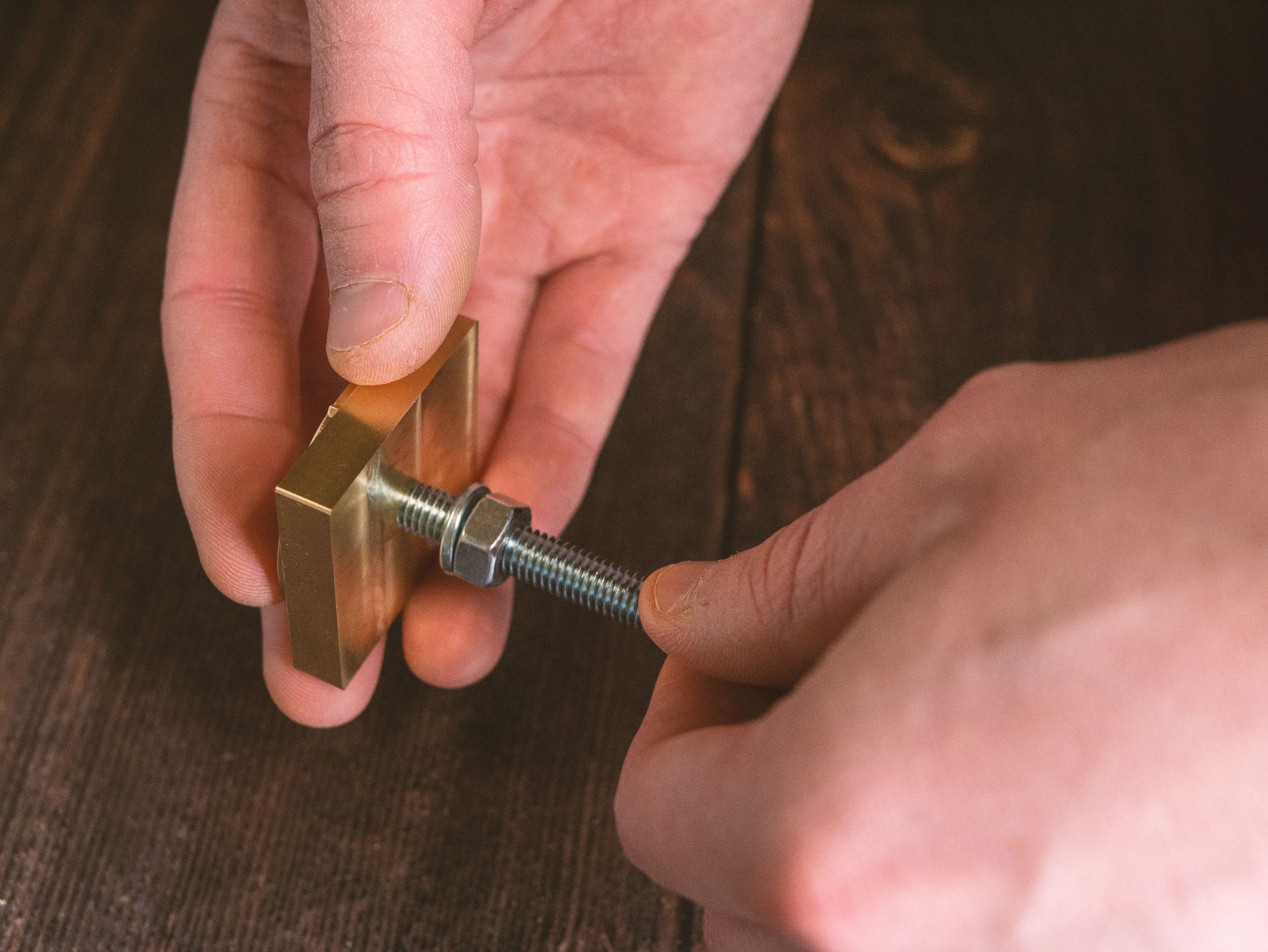 Screwing Wood Branding Iron Into Handle - Outpost Workshop